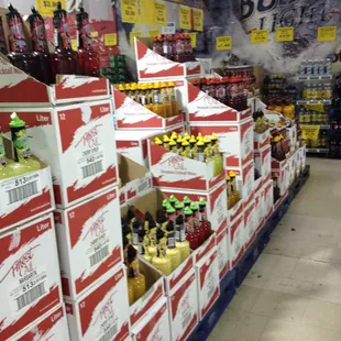 a large display of beer in a grocery store
