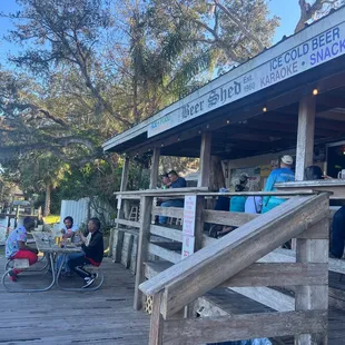 a group of people sitting outside