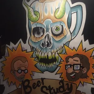 a drawing of a skull and a mug