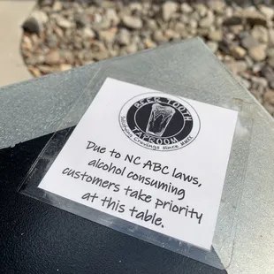 a sign on a table