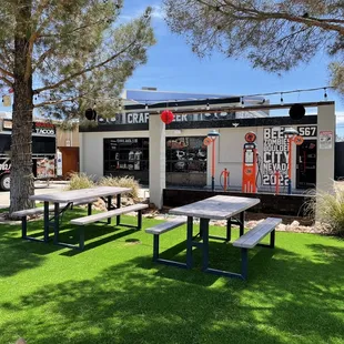 Nice outdoor patio area can wait to drink a a beer and play corn hole