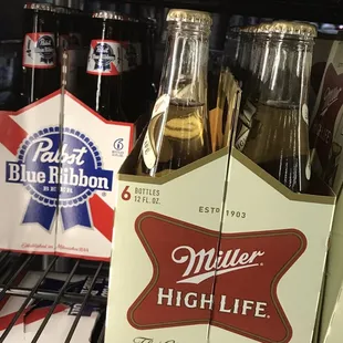 a display of miller's high life beer bottles