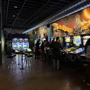 a row of pinball machines