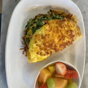 Omelette with spinach and side of fruit