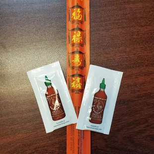  two packets of hot sauce