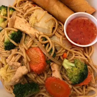 Chicken Lo-Mein with our famous homemade Egg Rolls!