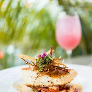 Chilean Sea Bass - confit fennel and tomatoes, lemongrass beurre blanc, black tobiko, crispy leeks.