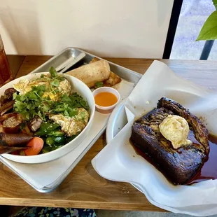 a plate of food and a bowl of salad