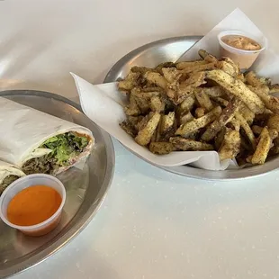 Lamb Wrap and fries. Fries are a meal by themselves.