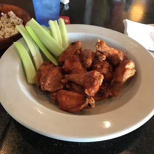 Chicken Wings (Hot Sauce). Order of 12. Meat quality real good. Unbreaded  Traditional.
