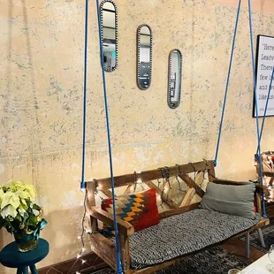 a living room with a swing
