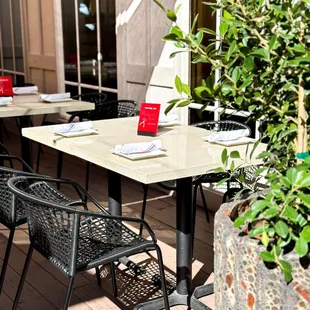 a table and chairs outside a restaurant