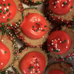 a plate of cookies with sprinkles