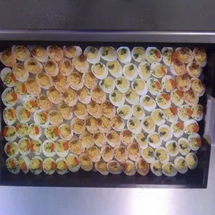 a tray full of appetizers