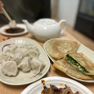 three plates of food on a table