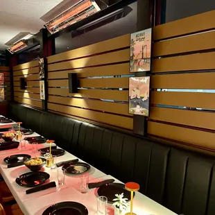a long table with plates of food on it