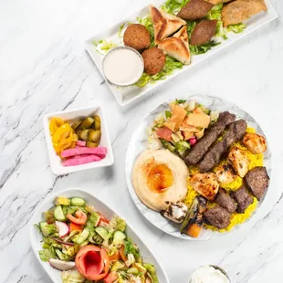 a variety of food on a marble table