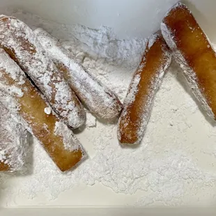 Tossed beignet sticks