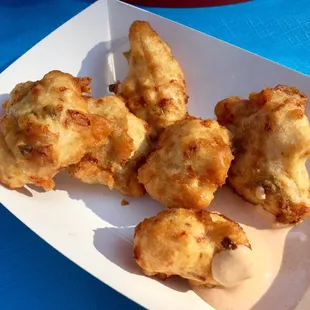 CHEDDAR &amp; BACON FILLED BEIGNETS WITH CHIPOTLE CREMA ($6) from Howlin' Wolf; my favorite!