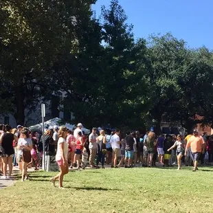 BY 11:15AM  THE TICKET LINE WOUND TO CAMP ST. It was so long I took a panorama to get it all in.