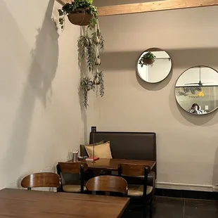 Bench seating in left corner of business ( cozy and private )