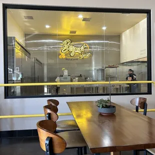 Open window, where you can see the beignets being prepped!