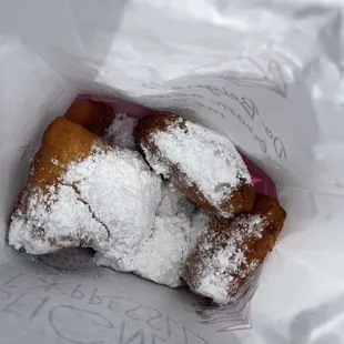 Fresh out of the fryer and dusted with powdered sugar