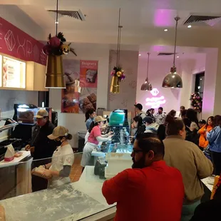 a crowd of people in a restaurant