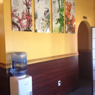 refrigerator, table, and chairs