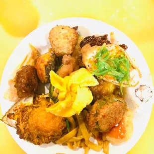 Plate of food with fried zucchini, stuffed crab yum!