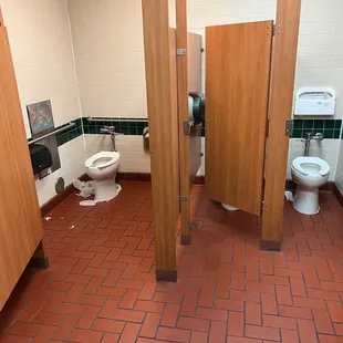 Filthy and messy toilets.