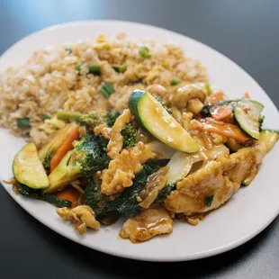 a plate of food with rice and vegetables