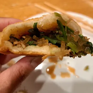 Inside a Chinese pancake - chives, glass noodles, pork