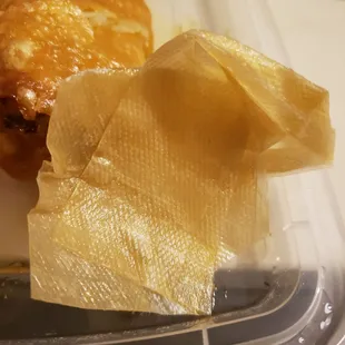 a piece of food in a plastic container
