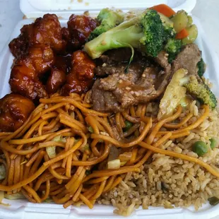 Fried rice and chow mein with orange chicken and broccoli beef