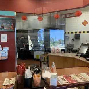 a view of the kitchen from the dining area