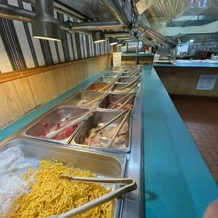 a buffet with a variety of food items