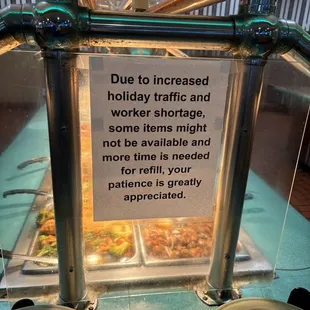 a sign on a buffet