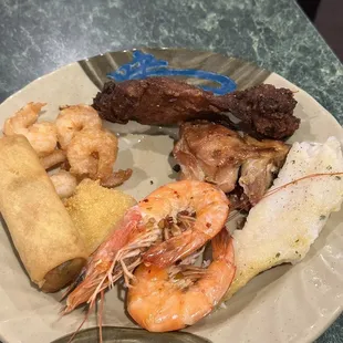 a plate of chinese food