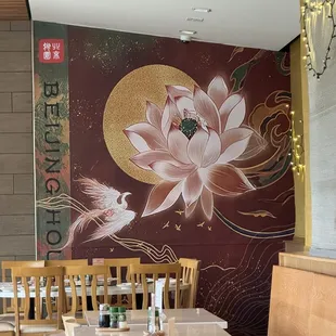 a restaurant with tables and chairs