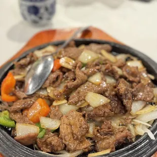 a dish of beef and vegetables