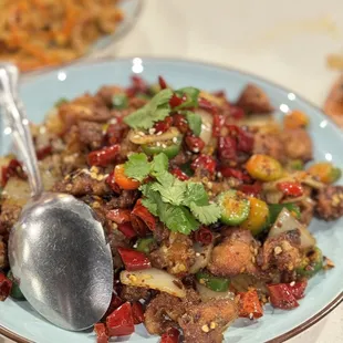 a plate of chinese food