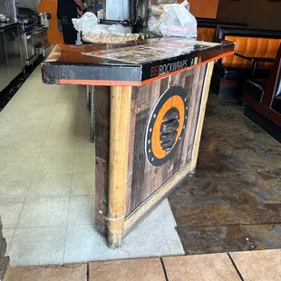 a counter with a pizza on it