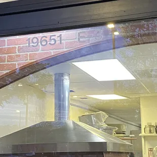 reflection of a car in the window
