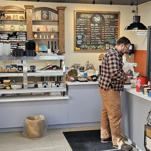 a man standing at the counter