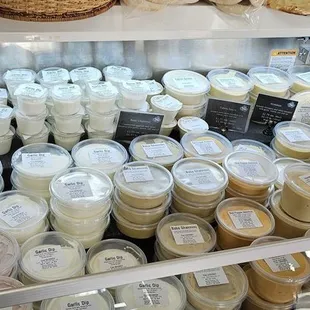 a display case full of dairy products