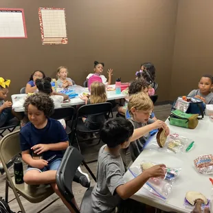 Kids participating in an art project at beKidZ