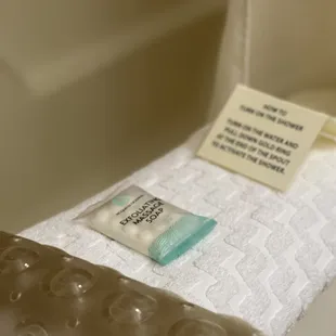 Love how they thought about the safety tub mat and bath rug with a note on how to operate their faucet &amp; shower :) it's the little things