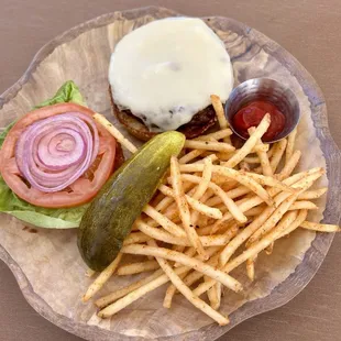 Bel-Aire Burger - Angus burger, soy butter glaze, age, white cheddar cheese, Louis sauce, butter lettuce, tomato and sliced red onion