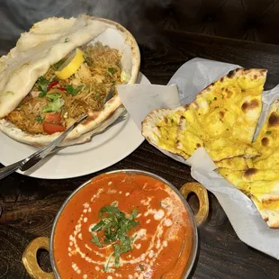Chicken biryani, Butter chicken, Garlic naan